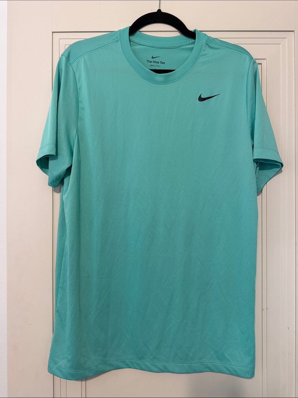 Nike Short Sleeve Dri-FIT Tee in Aqua Blue with Black Swoosh